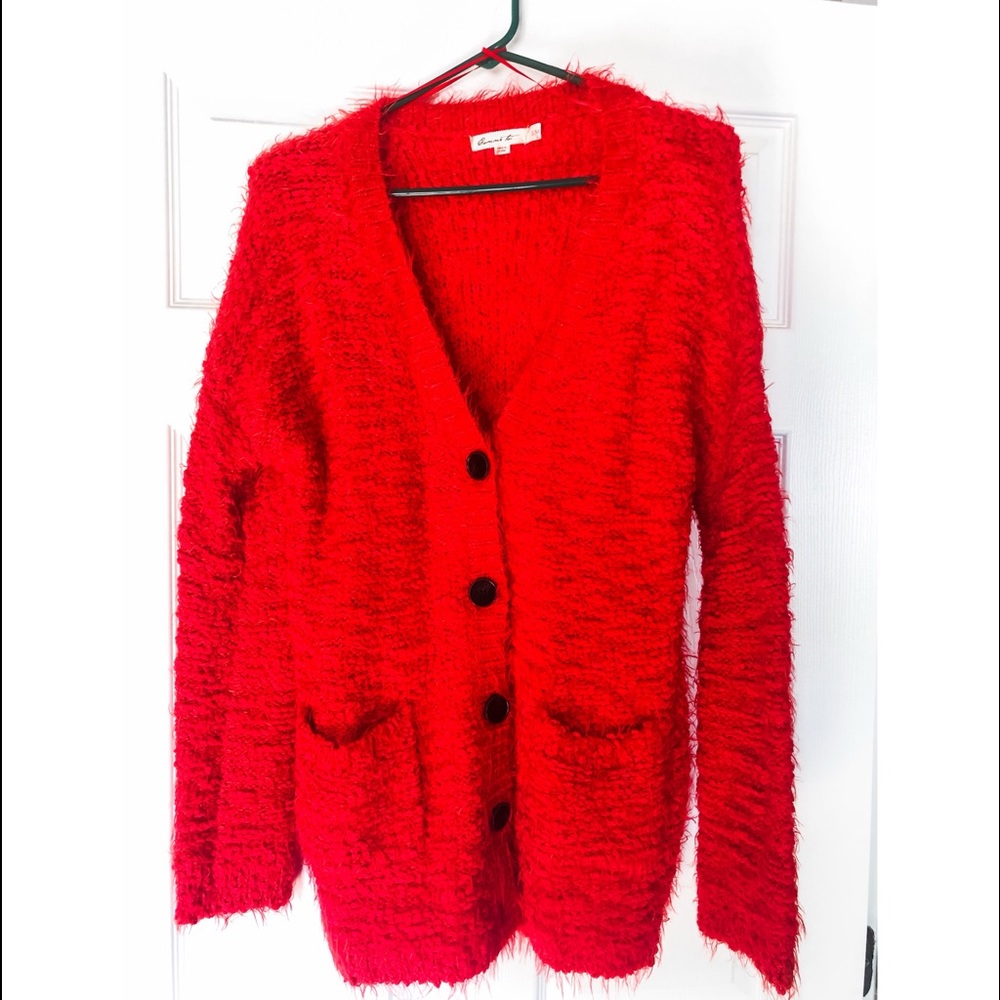 Red soft pocketed cardigan. Size small/medium